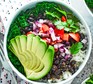 Burrito bowl with chipotle black beans, chopped onion, tomatoes and white rice