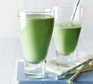 Green breakfast smoothie in two glasses